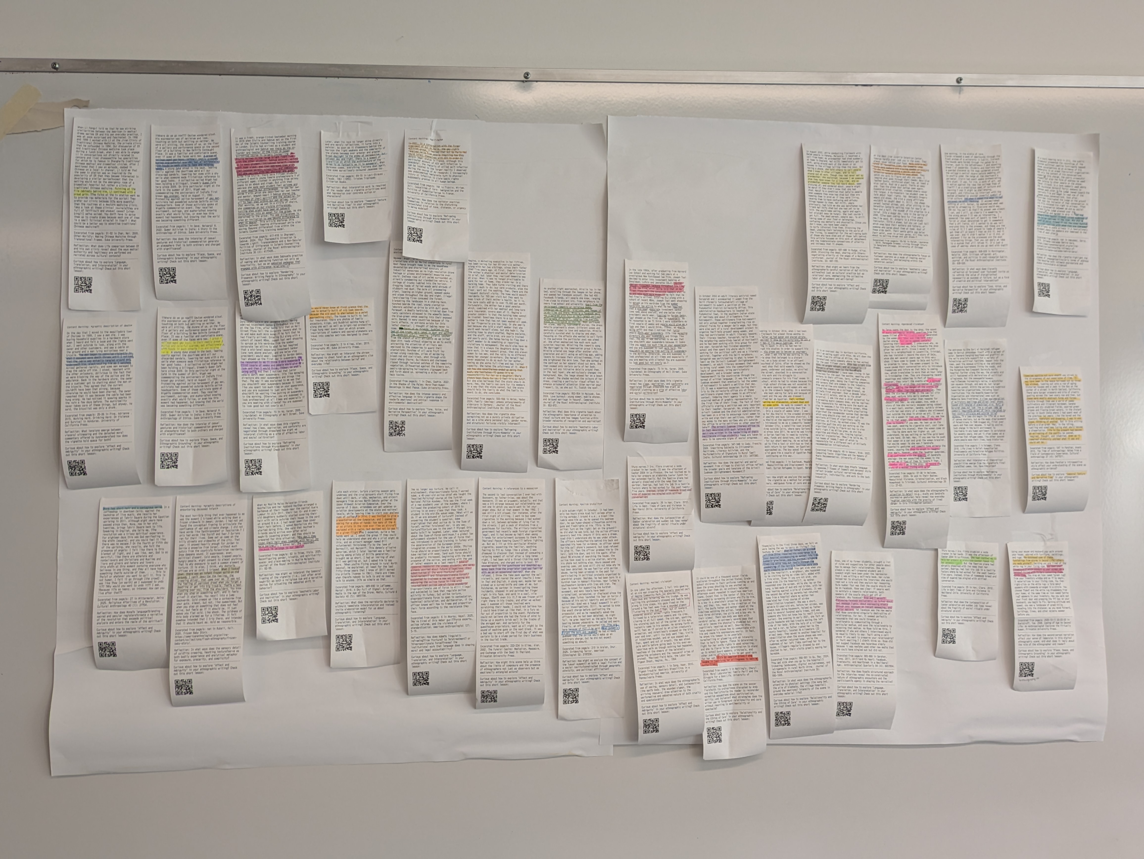 Vignettes on receipt paper taped on the board in the classroom